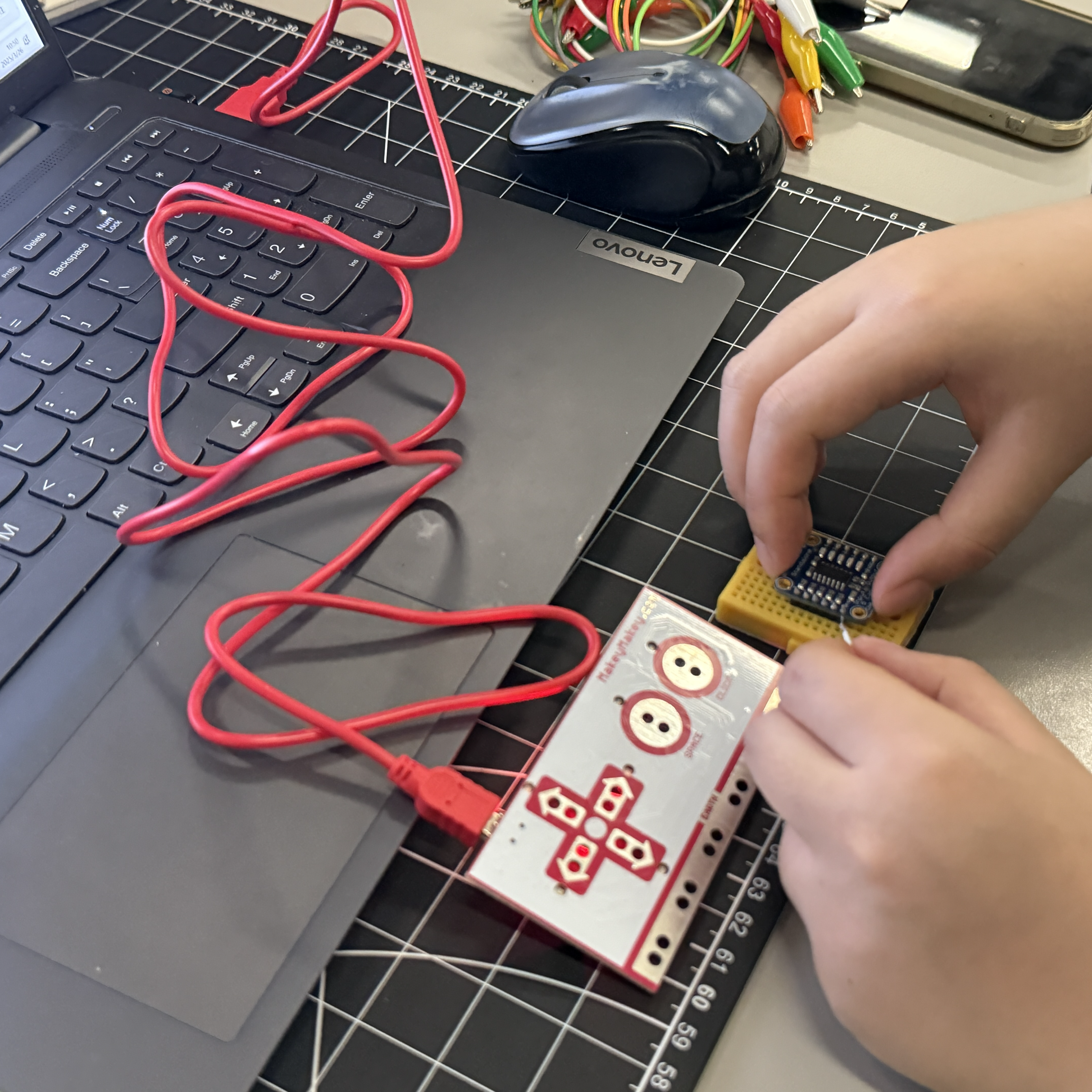 This was my first time experimenting with the Adafruit 5-key Capacitive Touch Sensor Board. Initially, I thought I needed to insert the wires directly into the sensor, but it didn’t work as expected.