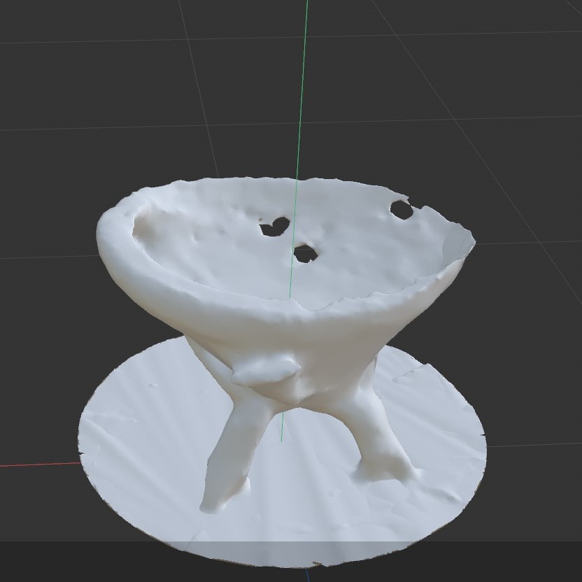 I imported the abalone shell into Cinema4D, however the holes were not fixed very well. And the abalone shell is almost sticking to it's supports. I'm more than sure to rescan my abalone shell and adjust it again in Meshmixer.