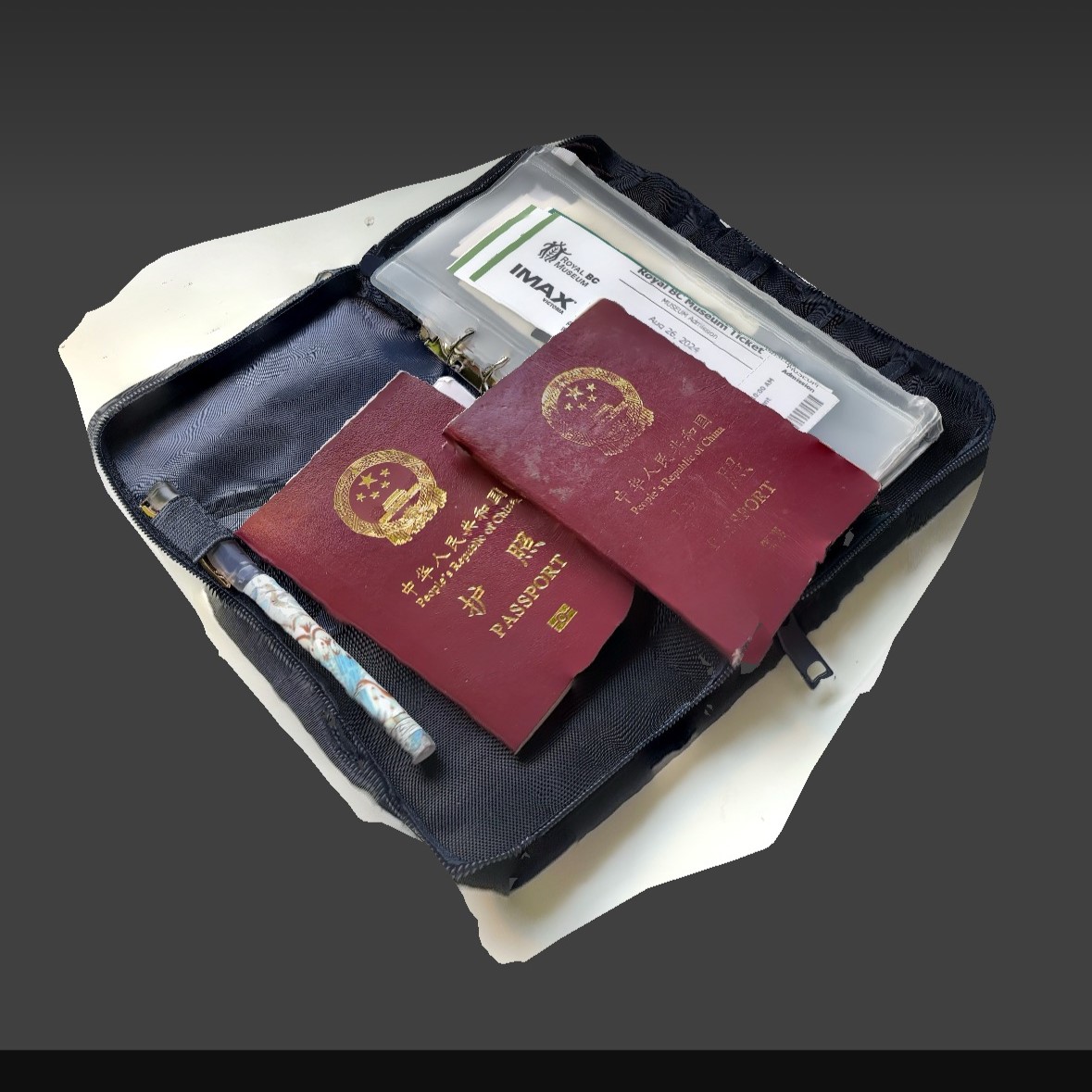I also tried to scan my travel carry-on handbag. It contains my passport, some tickets, and some souvenir coins. However I had a hard time placing it properly, and even if I tried to hang the bag, the contents would fall out, so I didn't have the option to continue scanning and editing it.