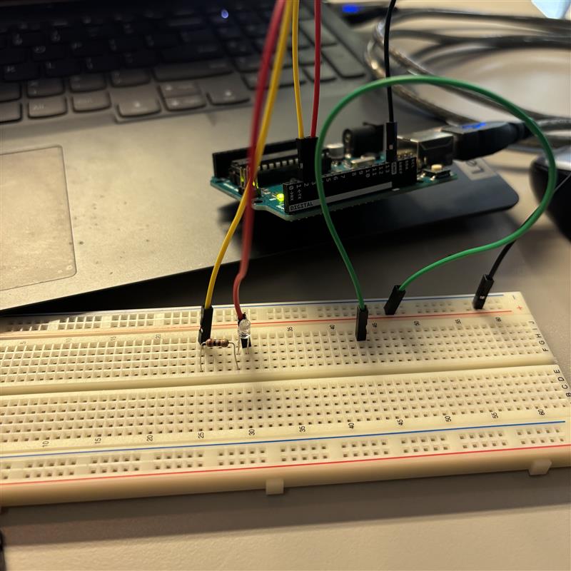 This picture shows the moment when I was preparing to add another LED. However, as soon as I reached this step, the existing LED started to emit a flickering light. Clearly, this was a malfunction. My guess is:
1. The newly added green wire acted like a resistor, allowing only a tiny current to pass through, which caused the LED not to light properly.
2. The circuit itself should not have been connected, but the metal strips inside the protoboard may have made slight contact, resulting in an intermittent current.
This was the most memorable malfunction in Activity 1 and the one that made me think the most.
